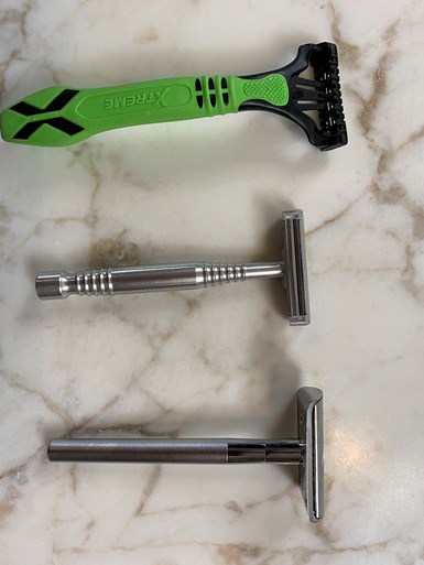 Disposable razor, Maxwell June metal razor, and a traditional wet shaving razor